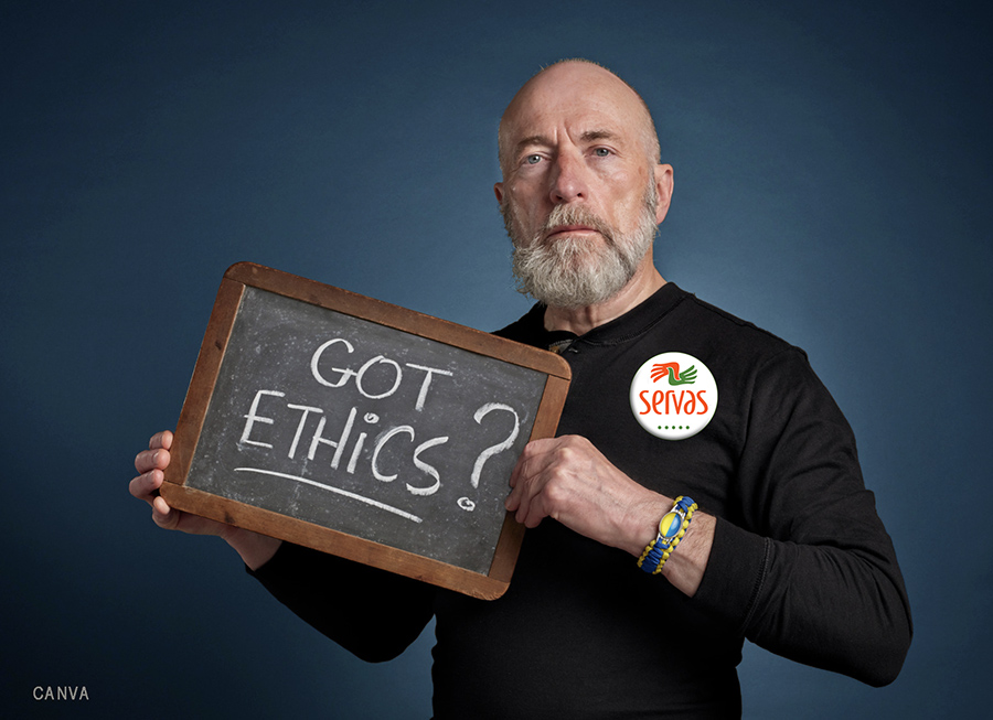 photo of man holding sign that reads "Got Ethics?"